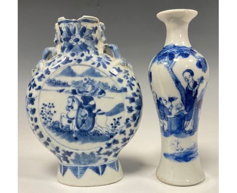 A Chinese moon flask, painted in tones of underglaze blue with warriors on horseback, within circular reserves on a ground of