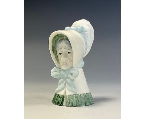 A Royal Worcester candle snuffer, Old Woman, 9cm high, black printed mark 