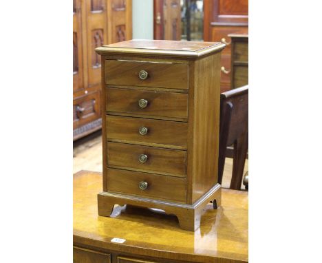 Miniature mahogany chest of five drawers on bracket feet, 45cm by 28cm