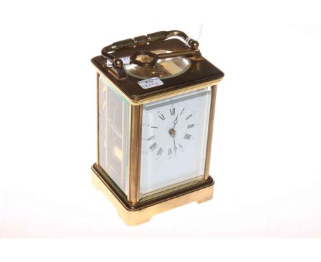 Brass cased carriage clock, 13cm excluding handle