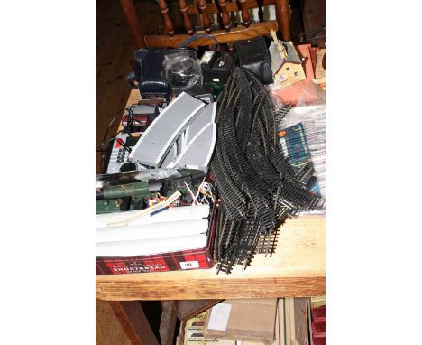 Model railway equipment including engine, track, rolling stock, transformer, etc and assorted camera equipment