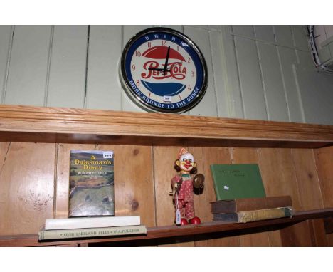 Pepsi Cola quartz clock, clockwork clown and six Lakeland books