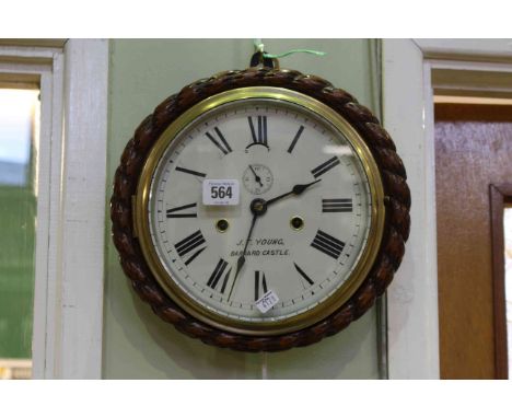 Circular oak cased wall clock, the dial signed J.T. Young, Barnard Castle