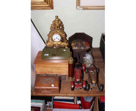 Ornate gilt metal mantel clock, cuckoo clock, two tinplate cars, Murray & Heath telescope, boxes, badges, etc