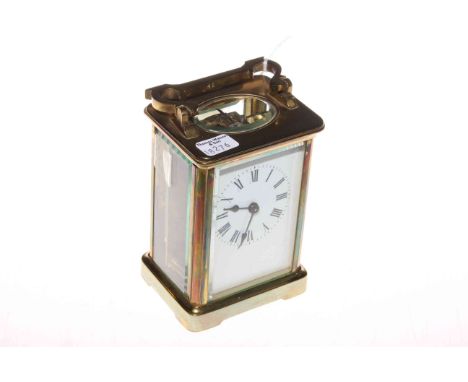 Brass cased carriage clock, 12cm excluding handle