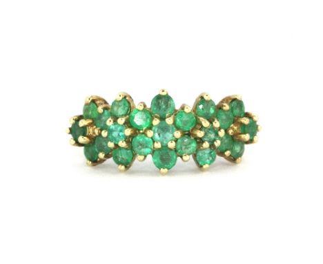 A 9ct yellow gold emerald set cluster ring, (N).&nbsp;Weight - 2.7g.