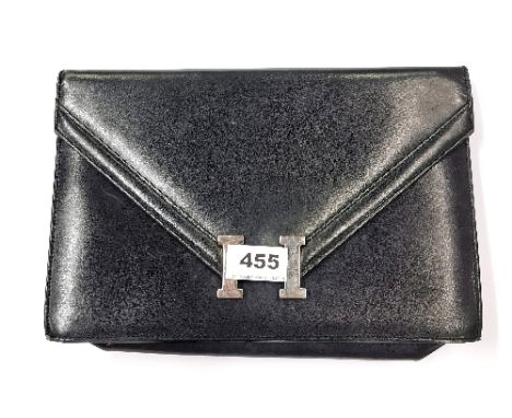 A vintage Hermes dark blue leather clutch bag.