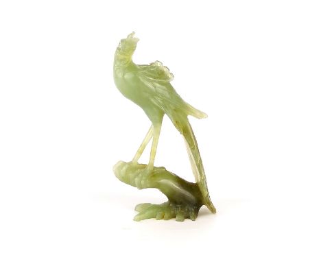 A Chinese carved spinach jade/hardstone figure of a phoenix, H. 9cm.