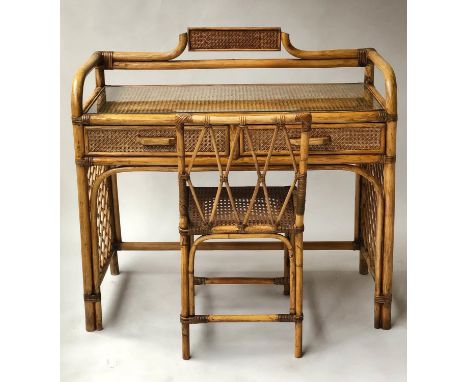 WRITING TABLE/CONSOLE, Vintage rattan and cane panelled with glazed writing surface, two frieze drawers and matching chair, 1