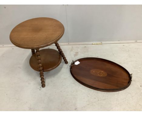 An Edwardian oval mahogany inlaid tea tray, width 55cm, and a late Victorian bobbin turned circular two tier occasional table