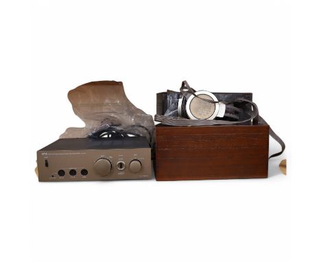 A pair of over-ear Japanese Stax Electrostatic earspeakers, SR-009S, contained within the original wooden box, with outer pac