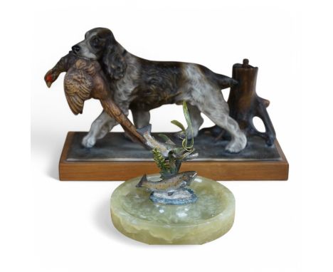 A cold painted bronze and onyx ‘rainbow trout’ ashtray and a painted spelter ‘hunting dog’ table lighter, 27cm. Condition - f