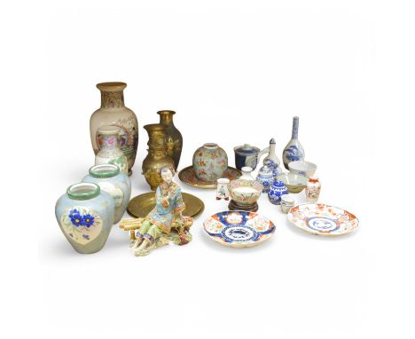 A large quantity of Chinese and Japanese ceramics and metalware to include Imari plates, blue and white vases and brass dishe