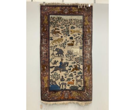 A modern North West Persian ivory ground rug, woven with a hunting scene, 170 x 95cm. Condition - fair