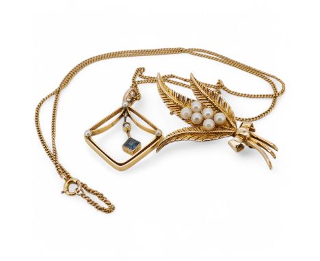 A 9ct, sapphire and seed pearl set open work drop pendant, 27mm, on a 9ct fine link chain, 44cm, together with a 9ct and cult