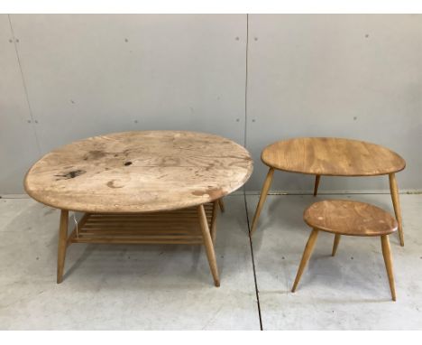 An Ercol oval elm coffee table and a nest of two tables, largest width 98cm, depth 84cm, height 44cm. Condition - poor