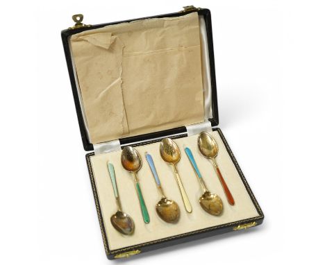 A cased set of six early 1950's silver gilt and polychrome enamel coffee spoons by Suckling Ltd (enamel a.f.).  Condition - p