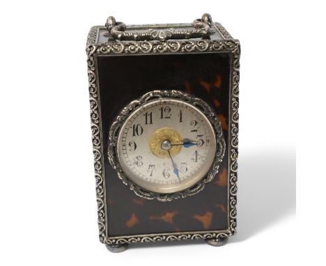 A late 19th century French tortoiseshell carriage clock, with white metal mounts, 15cm high. Condition - good, untested but c