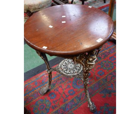 A Victorian Biclam Abolitionist pub table, stepped circular top, cast frame moulded with lion masks, thistles and a shield be