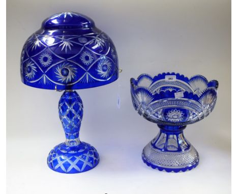 A cut glass lamp, domed shade, Bristol blue over clear glass, 48.5cm high over shade; a similar footed bowl, 27.5cm high, 27c