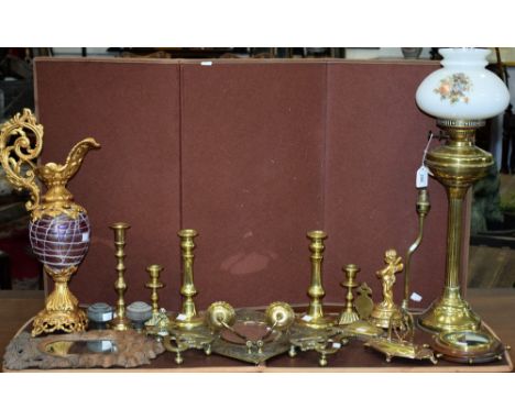 A brass Duplex twin burner oil lamp; a 'gilt' metal and pink glass decorative ewer; a square brass girandole type wall mirror