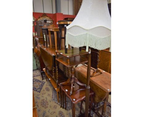 A George III style mahogany floor standing bookcase, rectangular top above a pair of glazed doors enclosing three shelves, ma