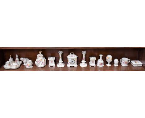 A Royal Crown Derby Posies pattern mantel clock; others, similar, including a pair of square chamber sticks, another, a pair 