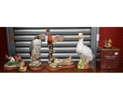 A Border Fine Arts study, of a Peregrine falcon, modelled by Russell Willis; another, pheasant, outspread wings, signed to ba