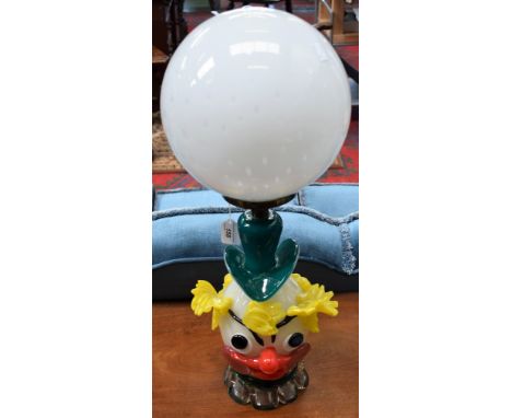 A Murano glass table lamp as a clowns head, with large white glass spherical shade, 59cm over shade