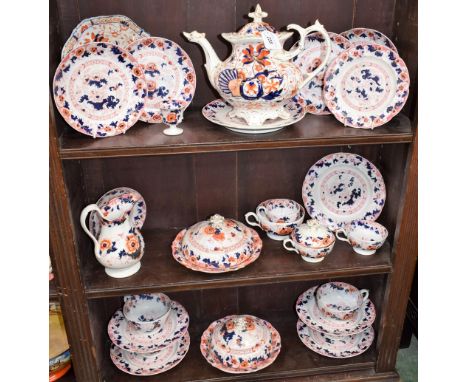 A pair of Victorian Staffordshire Imari palette Bentick pattern muffin dishes and covers; assorted cups and saucers, side pla