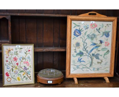 A late 19th century circular foot stool, turned wood, beadwork; a light oak fire screen, embroidered panel; an embroidered pa