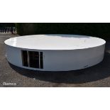 White circular wooden rostrum that Rita Ora performed her medley on in the Semi Final 1 interval