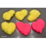 2x pink & 4x yellow heart shaped cushions used on presenters' sofas