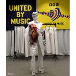 White Outfits worn by backing dancers during the United by Music performance by Mariya Yaremchuck
