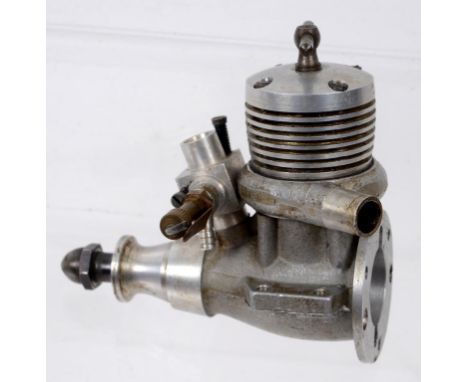 A John S Oliver 2.5cc Tiger MkIV R/C diesel engine, fitted with radial rear cover engine number T8543, (August 1979) includes