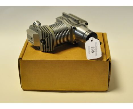 A Neil Tidy Laser 150S four stroke engine, with exhaust, stamped JSO to the body, believed unused, boxed  See illustration