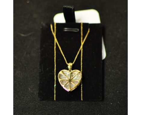 A 9ct gold and pavé set diamond harp pendant, on a chain