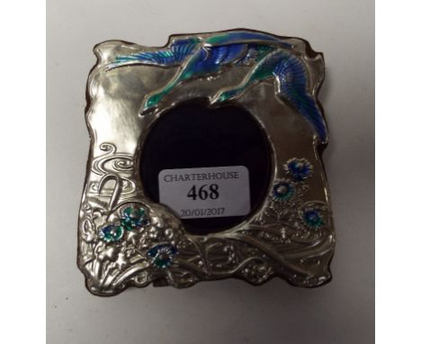 An Art Nouveau style silver and enamel photograph frame, decorated birds, 10.5 cm high