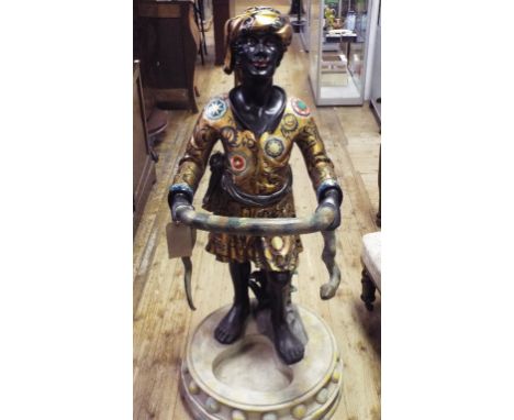 A Blackamoor style stick stand, with painted decoration, 122 cm wide Condition report Report by GHThis stick stand is made fr