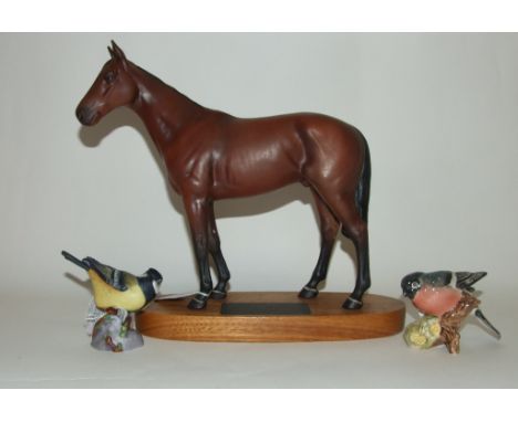 A Beswick Connoisseur Racehorse, Mill Reef 2422, Matt, a Beswick Bullfinch, 1042, gloss, a Royal Worcester Great Tit, 3335, a