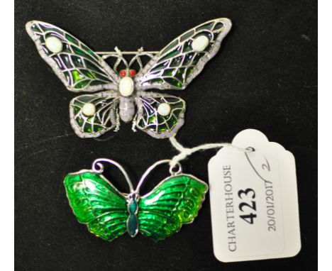 A silver and enamel butterfly brooch, and another similar (2)