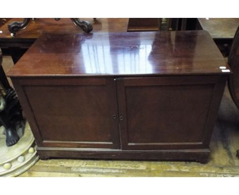 A 19th century mahogany folio style cabinet, having a pair of panel doors, 125 cm wide