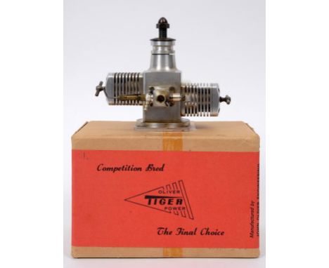 A John S Oliver 6.5cc experimental special prototype flat twin with Schnuerle port, the only engine made to this specificatio