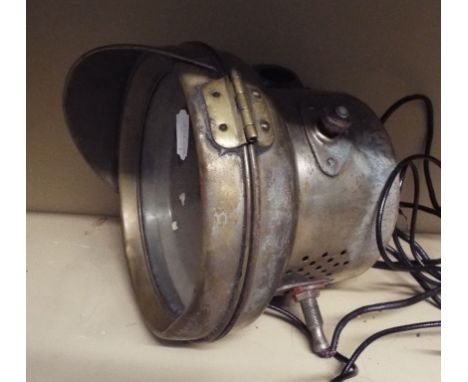 EXTRA LOT: A veteran period brass headlamp, with traces of nickel finish, 19 cm diameter (converted to electricity)