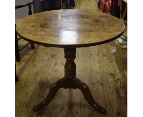 A 19th century oak tripod table, 80 cm diameter