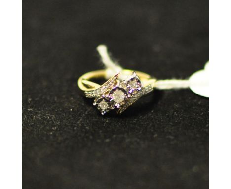 A 9ct gold and three stone diamond ring, approx. ring size K½