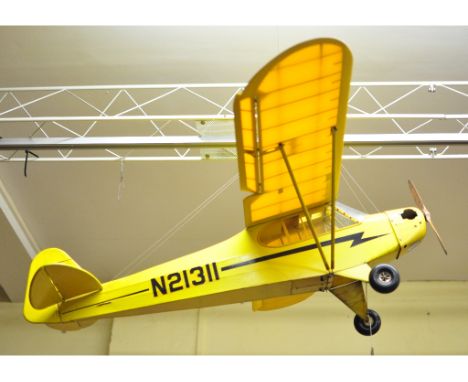 A Piper Cub radio controlled aircraft, constructed by John S Oliver, with 152 cm wing span, and Top Flight prop (lacks engine