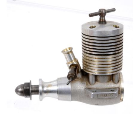 A John S Oliver Tiger 2.5cc MkIV MOD experimental side exhaust diesel engine, No T6097, (March 1967) (unused), boxed  See ill