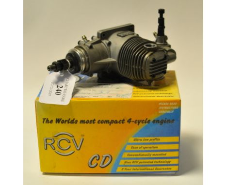 An RCV 58-CD four stroke engine, with exhaust, boxed