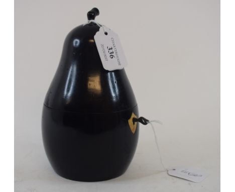 An ebonised tea caddy, in the form of a pear, 18 cm high